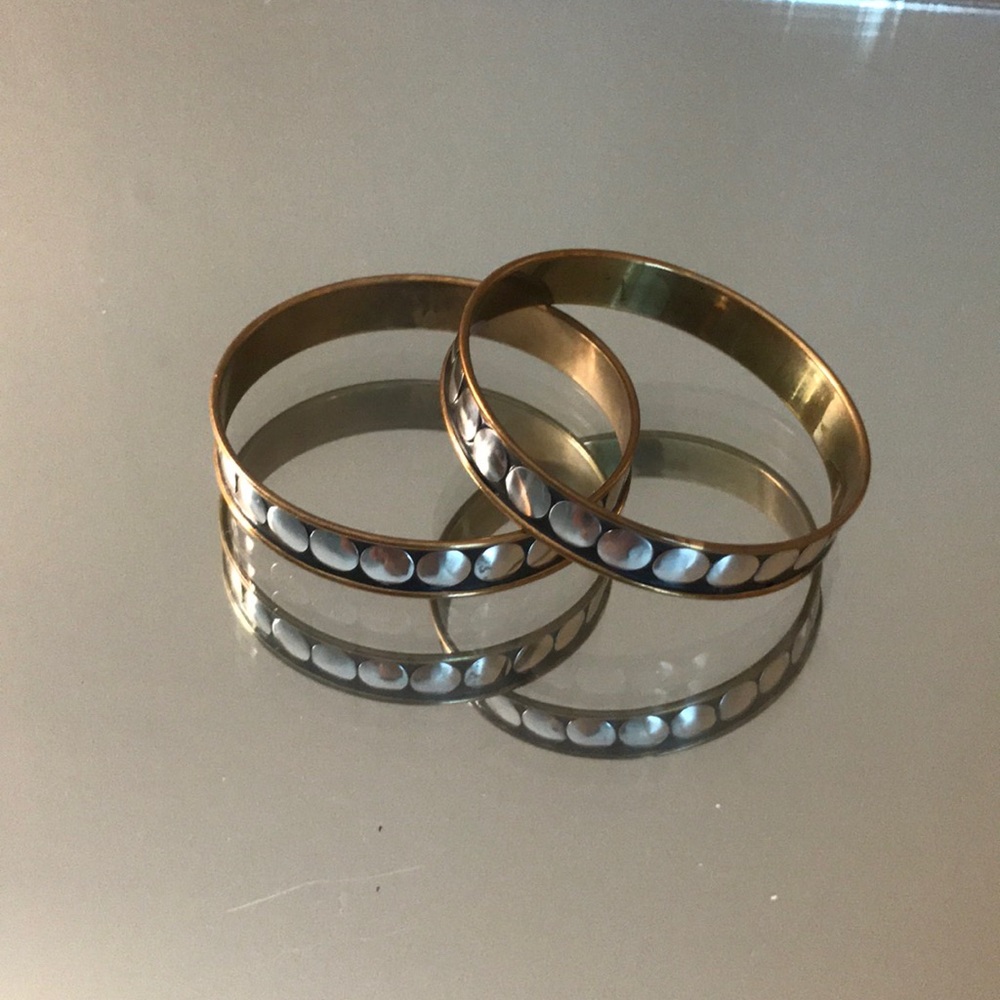Gold, silver and black bangle